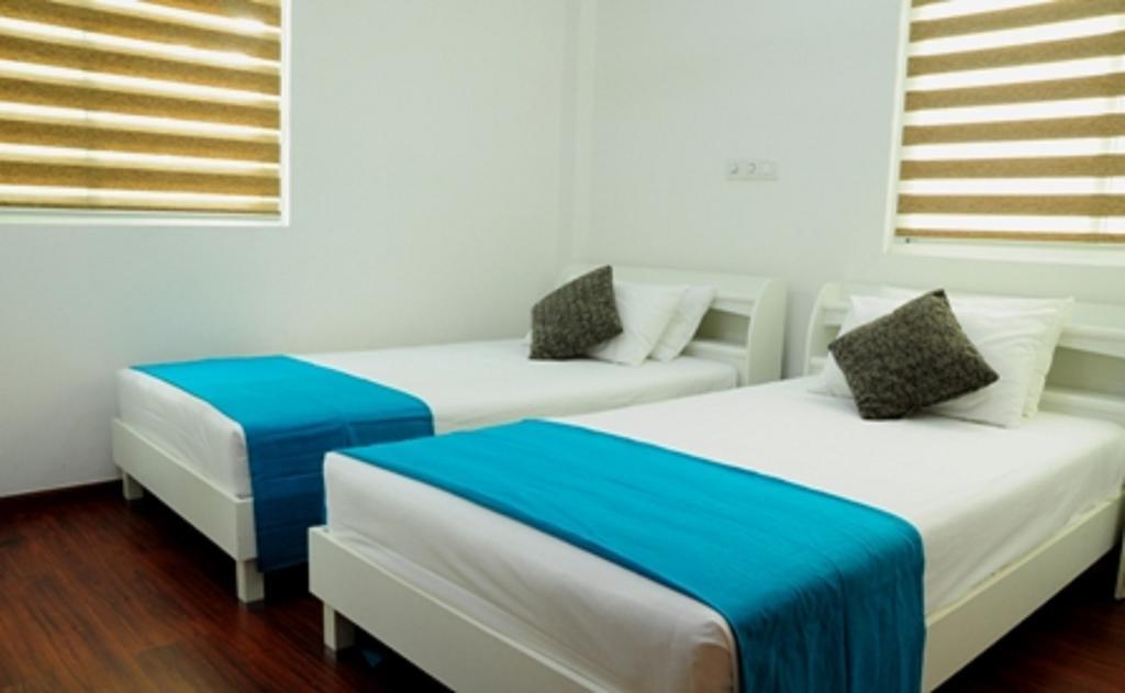 Holidaymakers Inn Hulhumalé Habitación foto